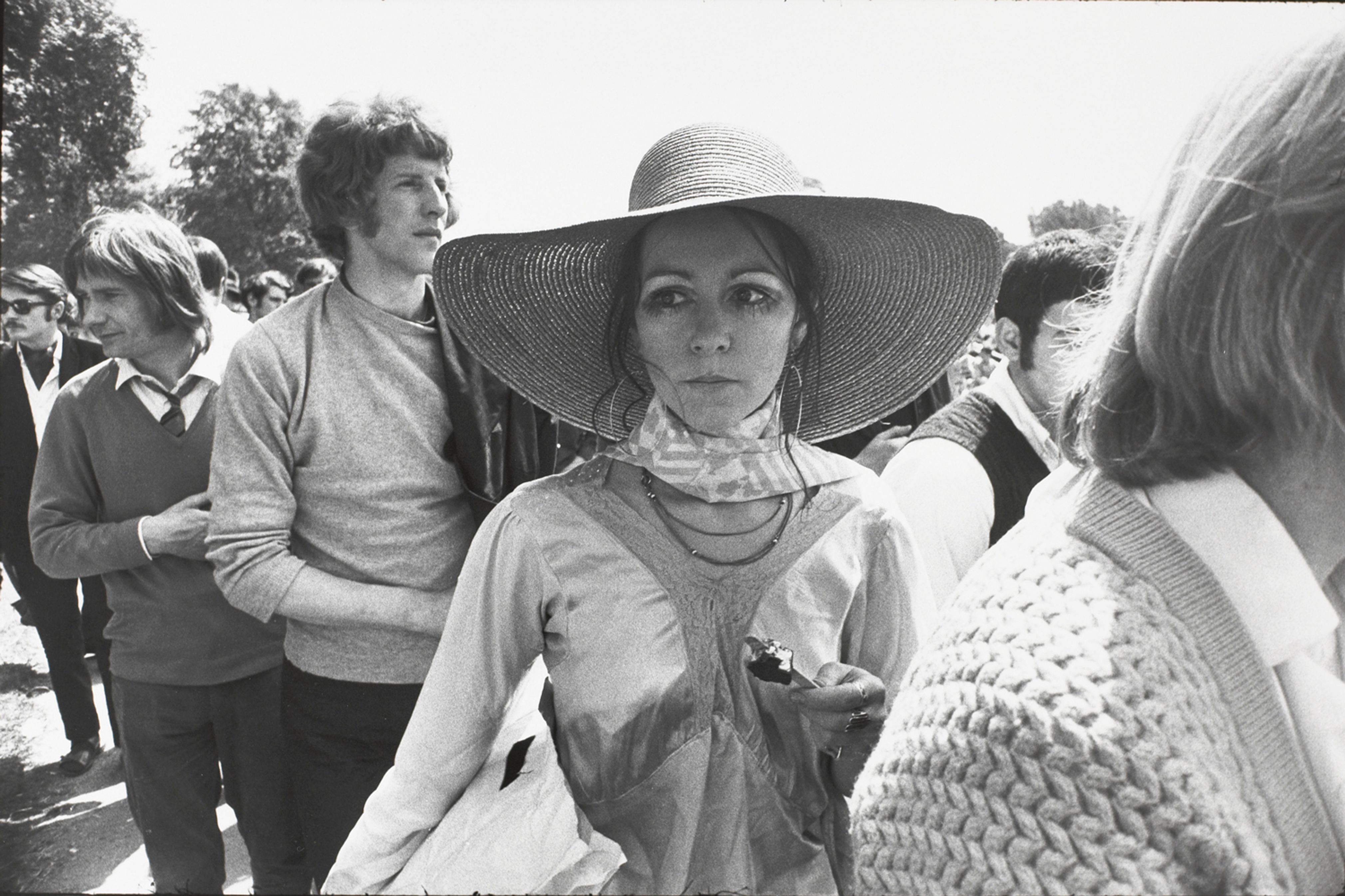 Untitled (Woman in a large brimmed hat eating an ice cream)