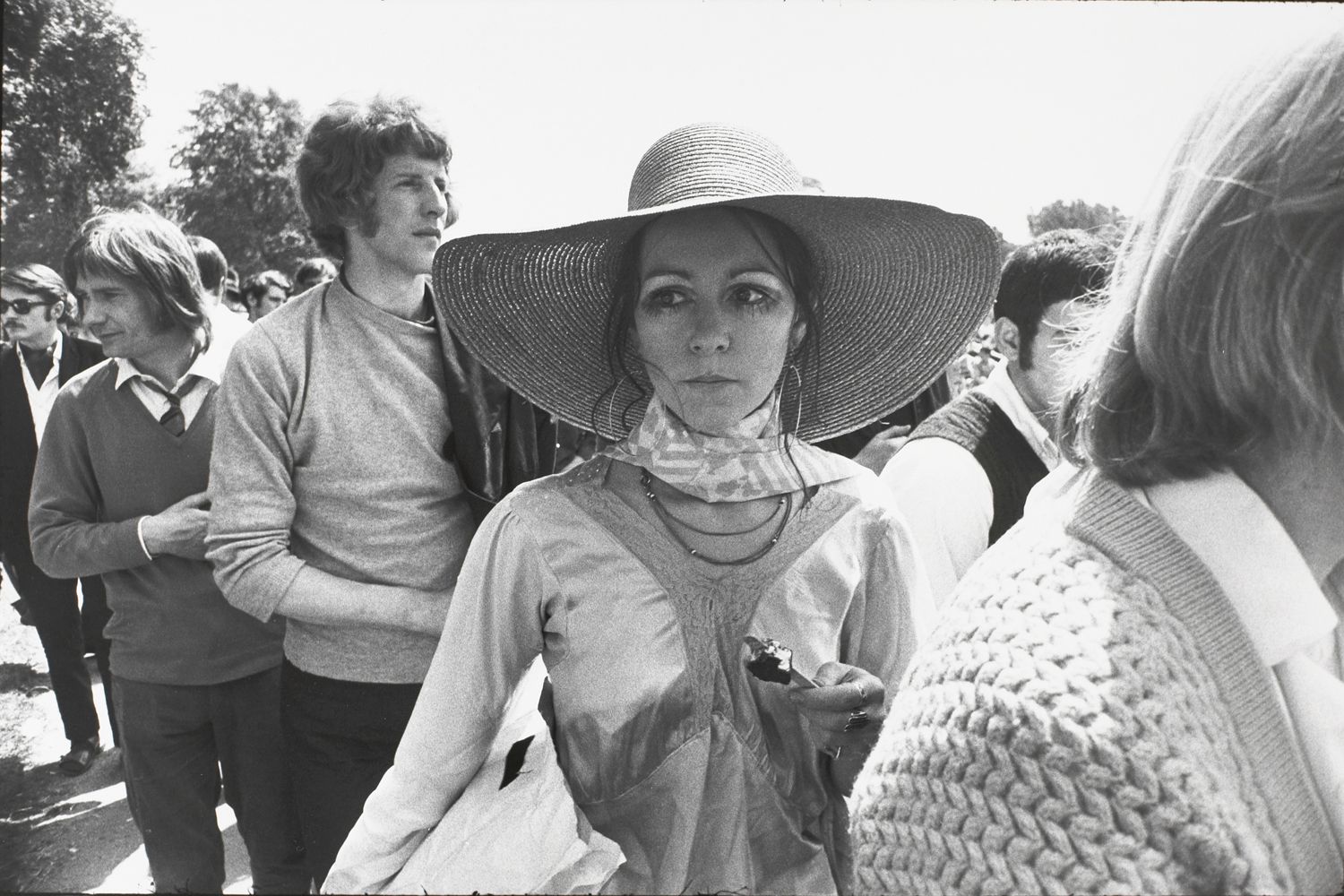 Untitled (Woman in a large brimmed hat eating an ice cream)