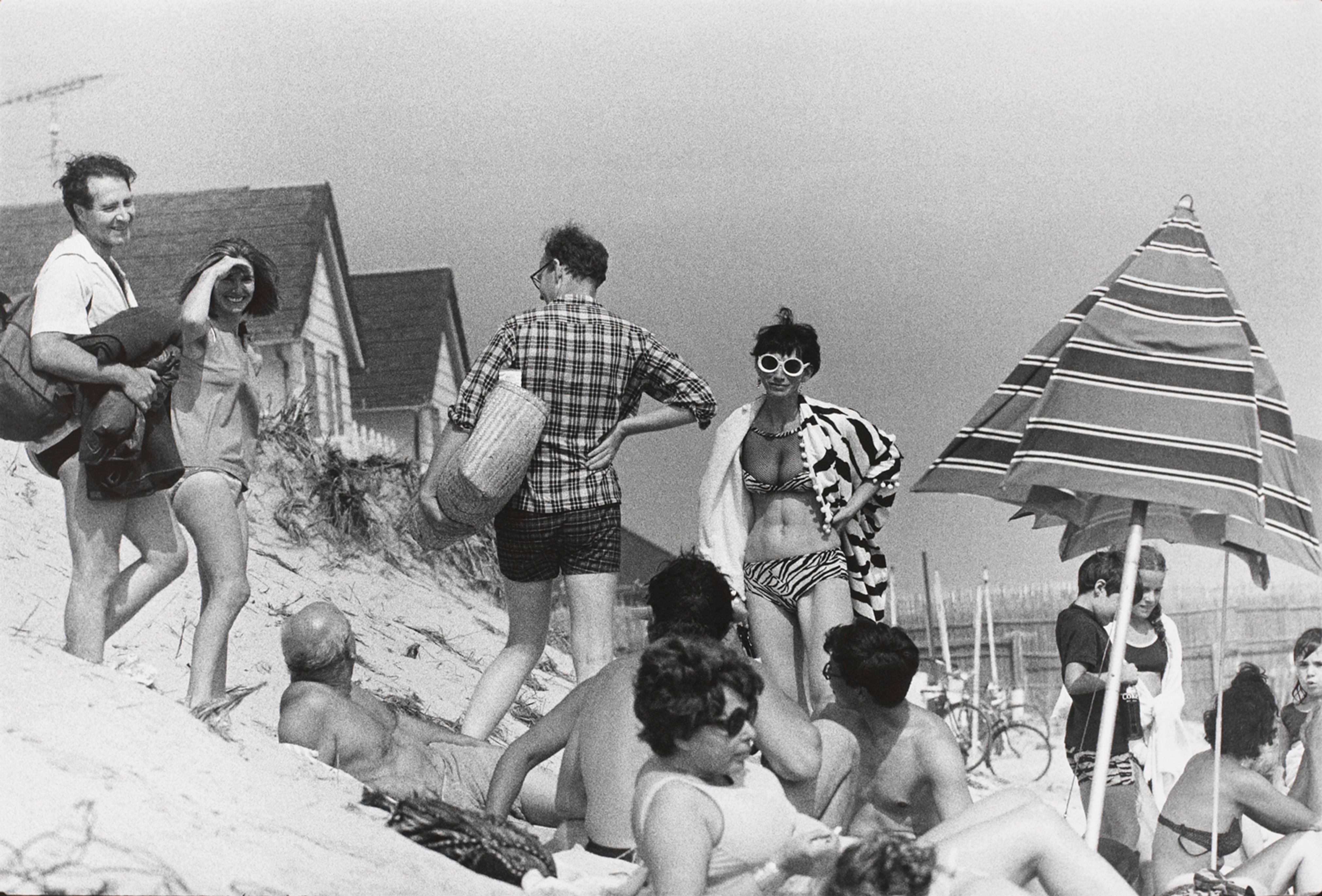 Untitled (A group of people on a beach dune)