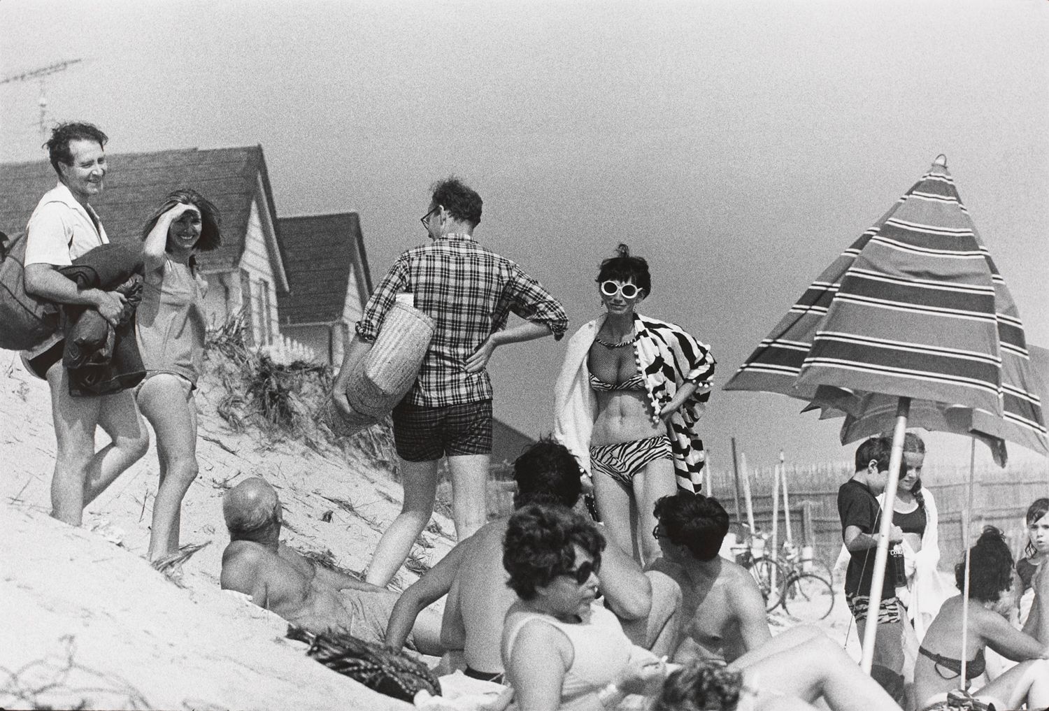 Untitled (A group of people on a beach dune)