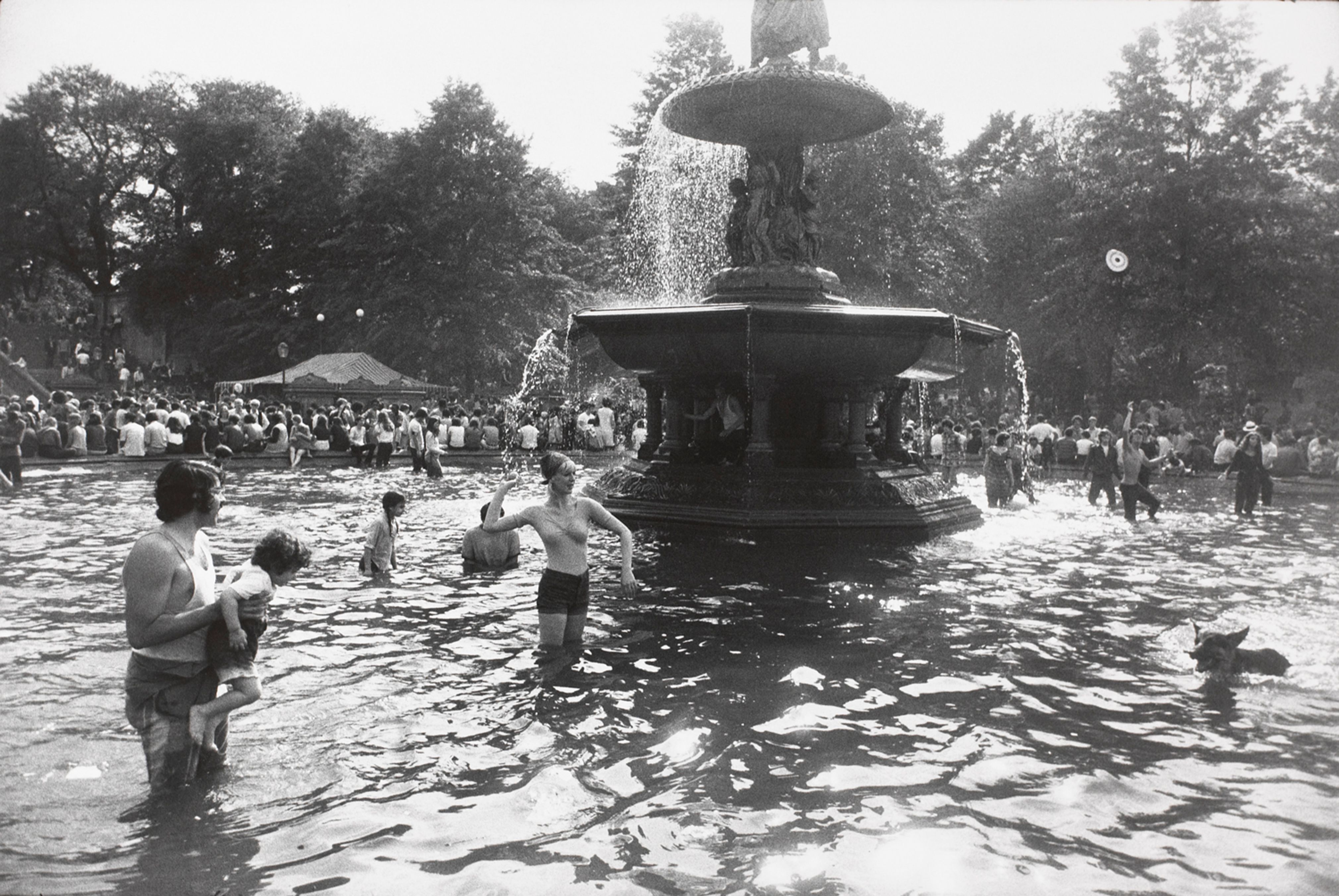 Untitled (People and dog playing in fountain, Central Park)