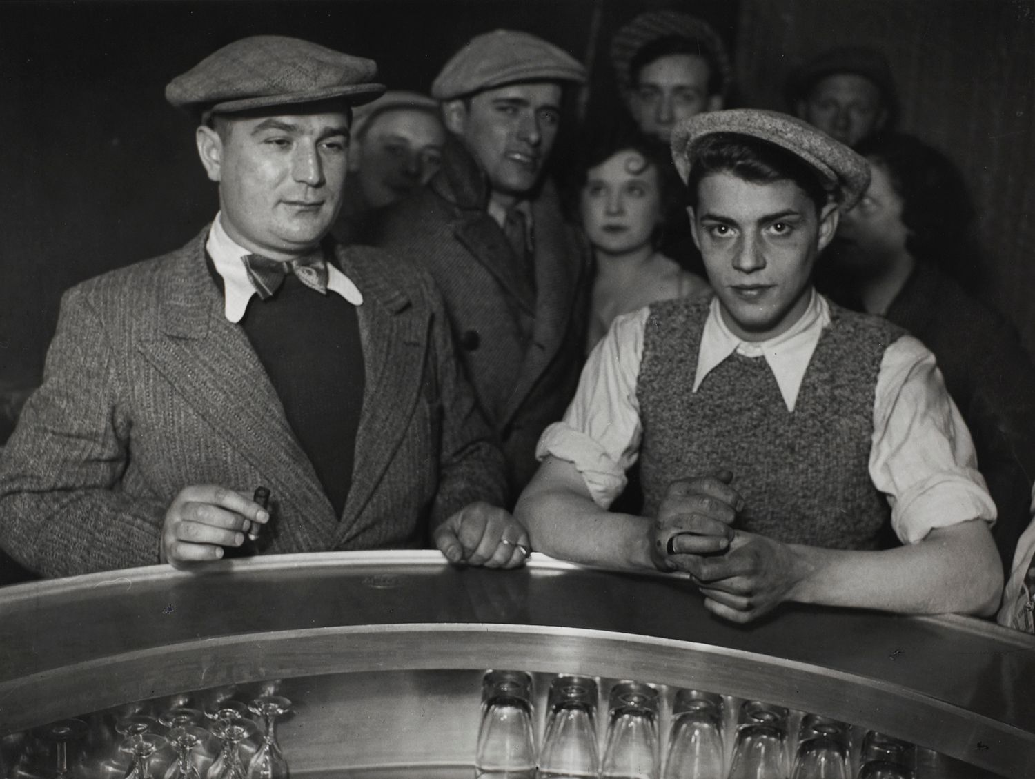 Group of men at the bar of a bistro, Rue de Lappe