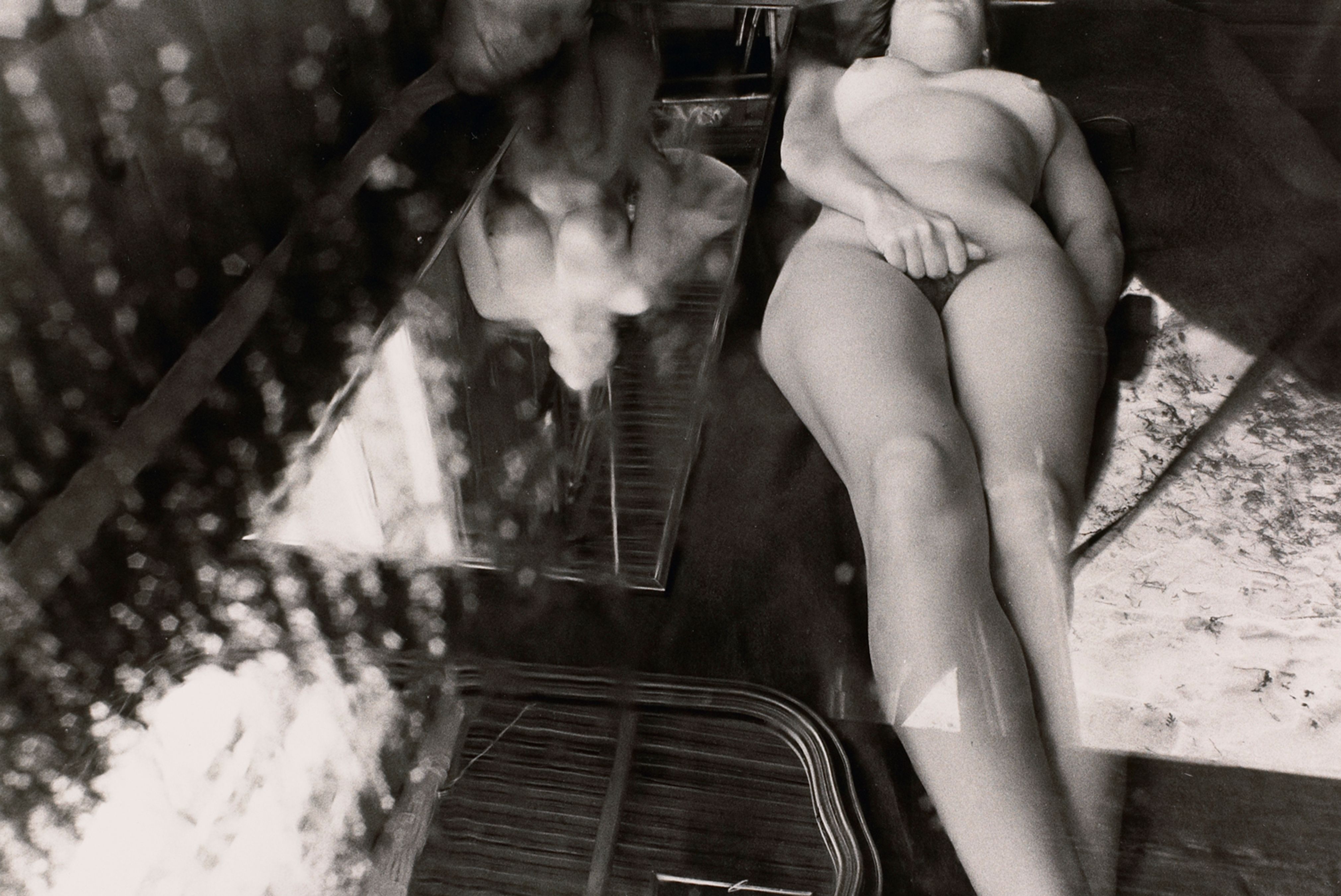 Untitled: Woman Laying Next to Another’s Reflection