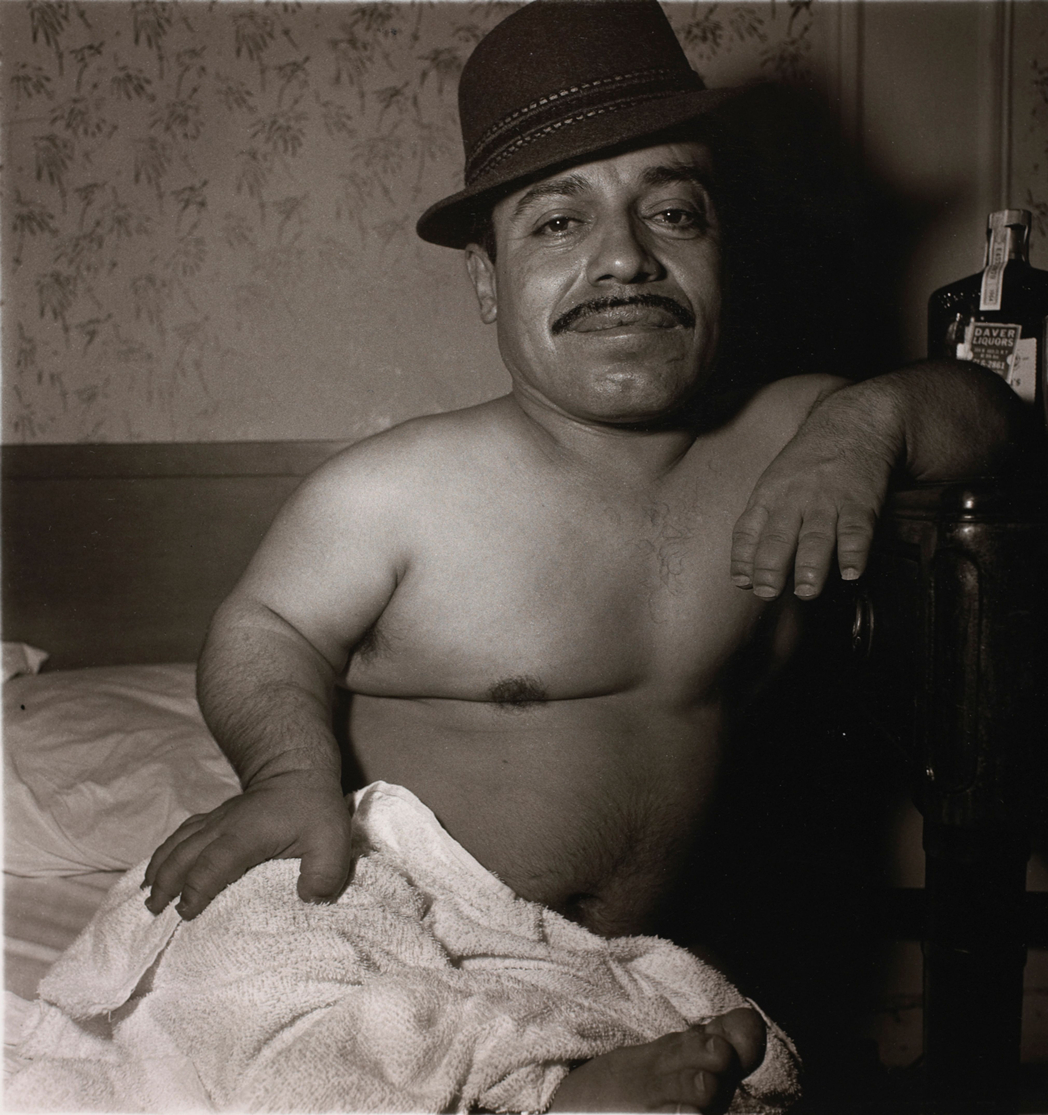 Mexican dwarf in his hotel room in N.Y.C.