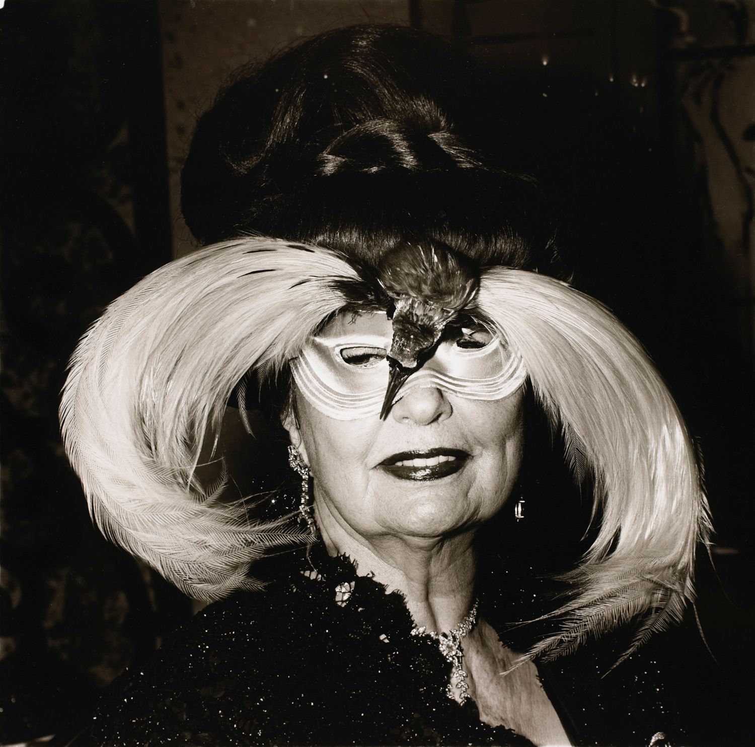 A woman in a bird mask, N.Y.C.