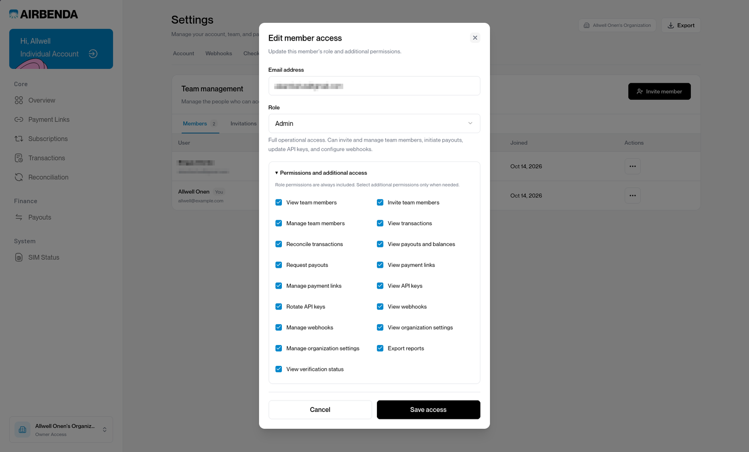 Edit member access dialog with an organization role and individual permission checkboxes.