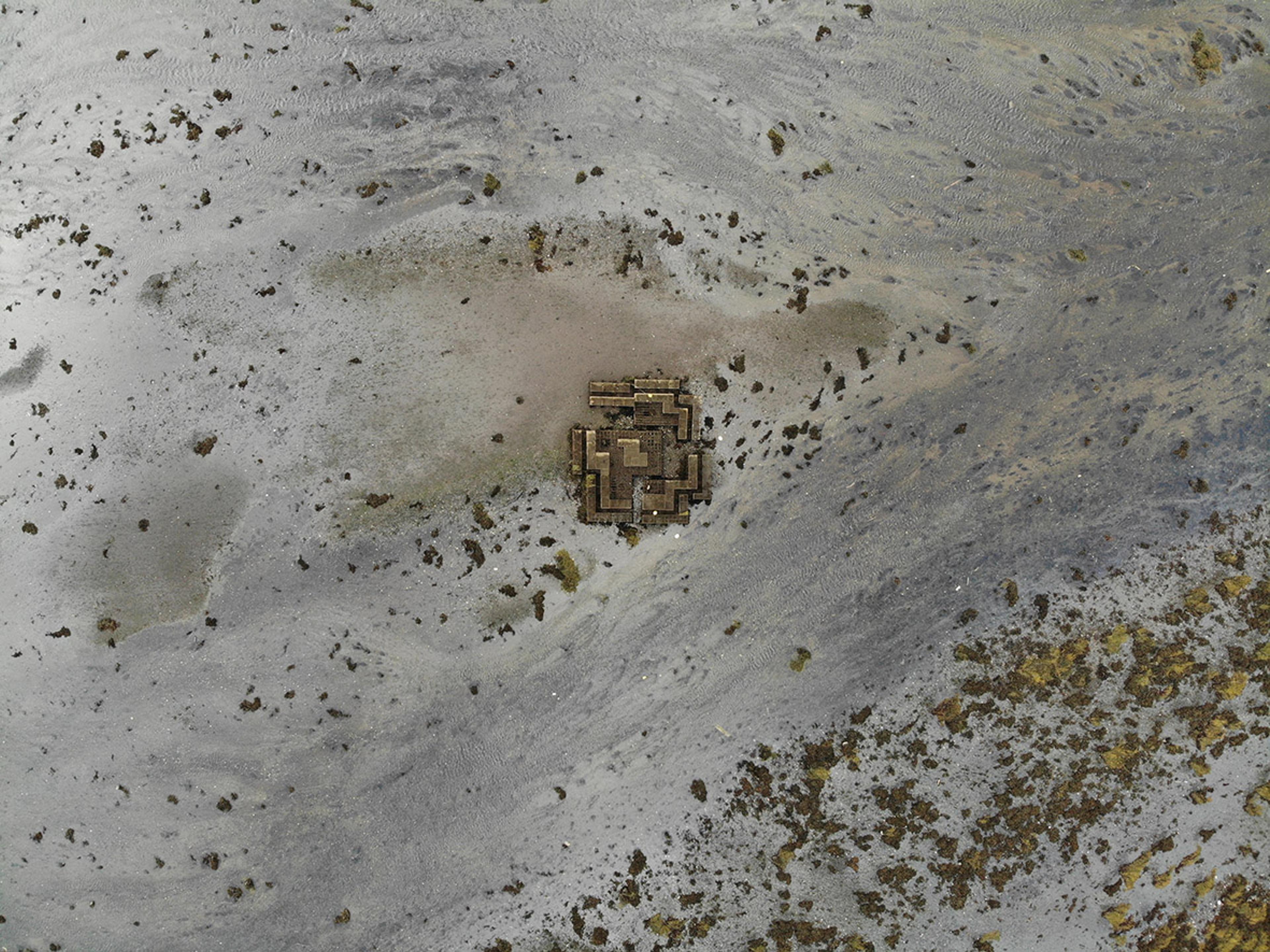 An aeriel view of people sat at the oyster table on the Isle of Skye