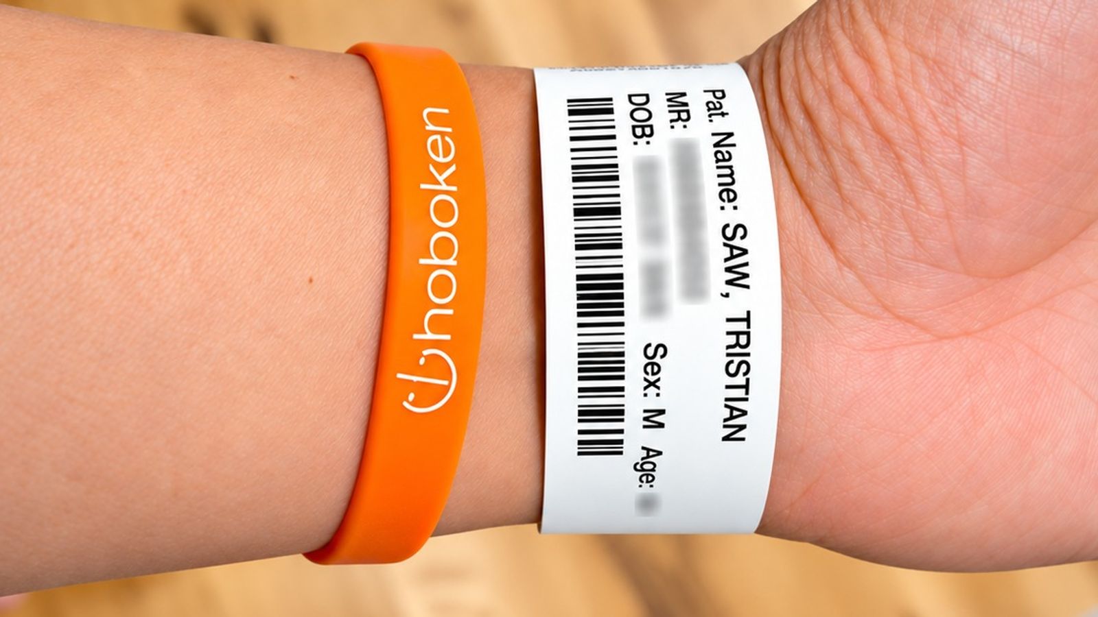 Hospital wristband and Hoboken Grace bracelet on wrist