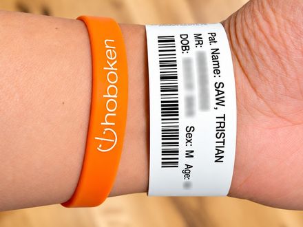 Hospital wristband and Hoboken Grace bracelet on wrist