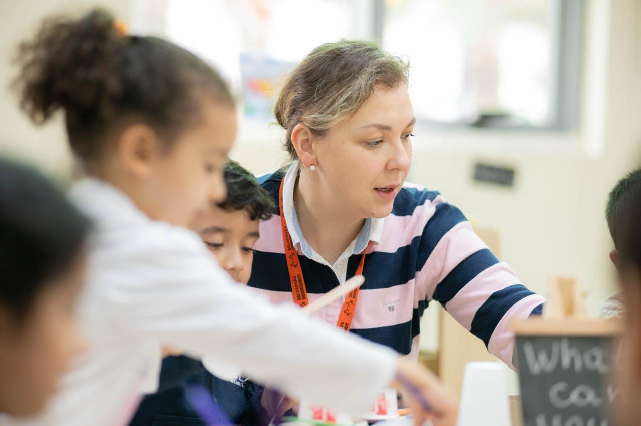 A UK-experienced early-years teacher working with children
