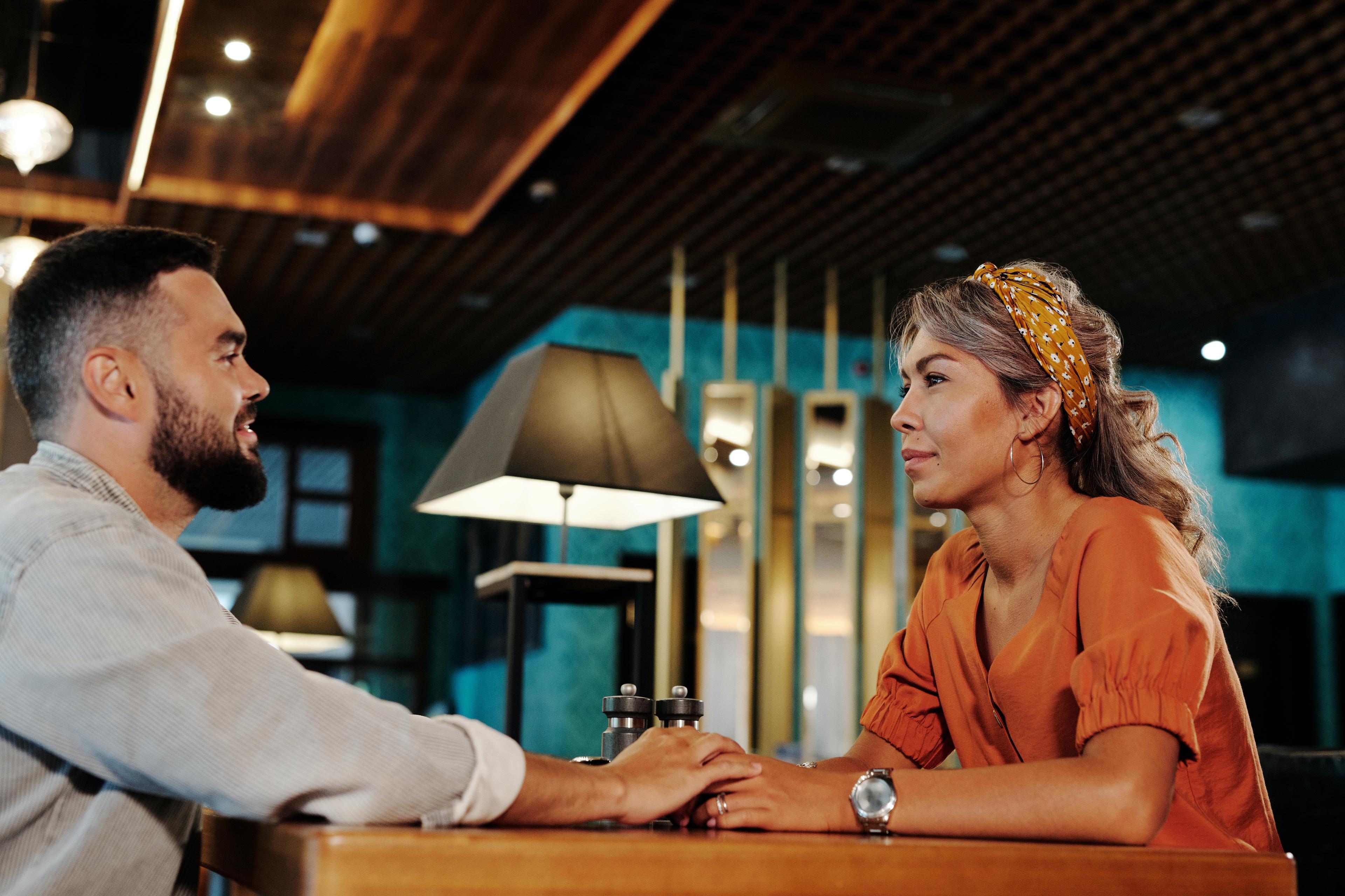 Couple sitting together at a restaurant