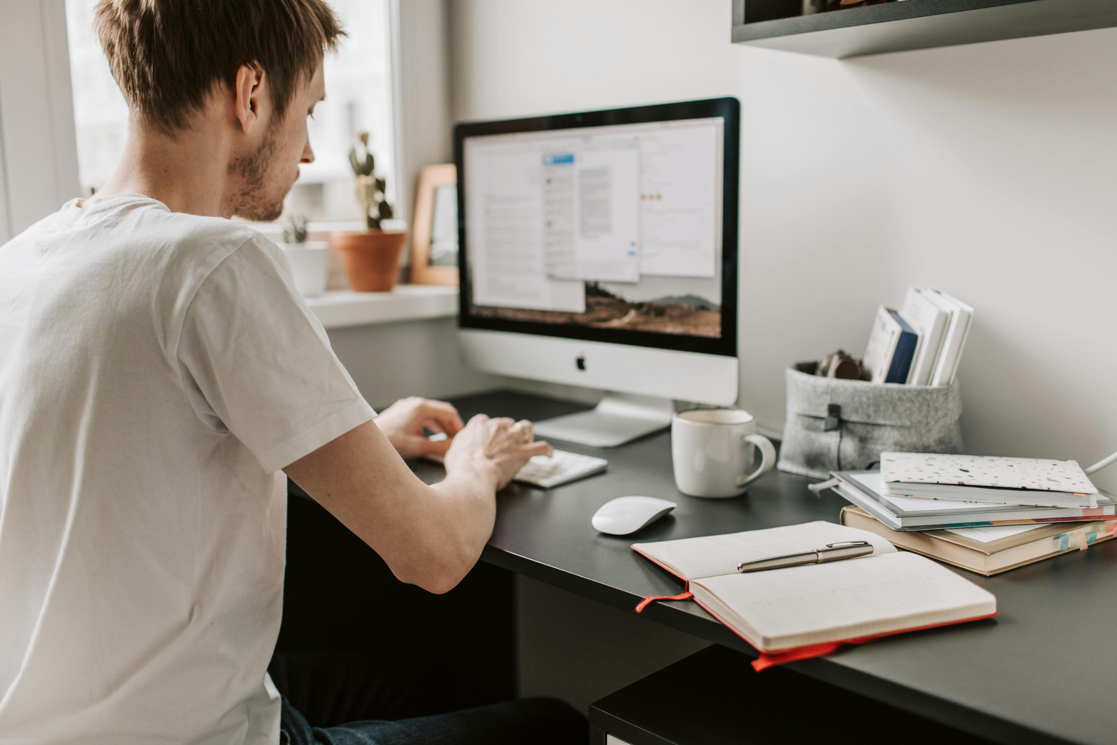 person on computer