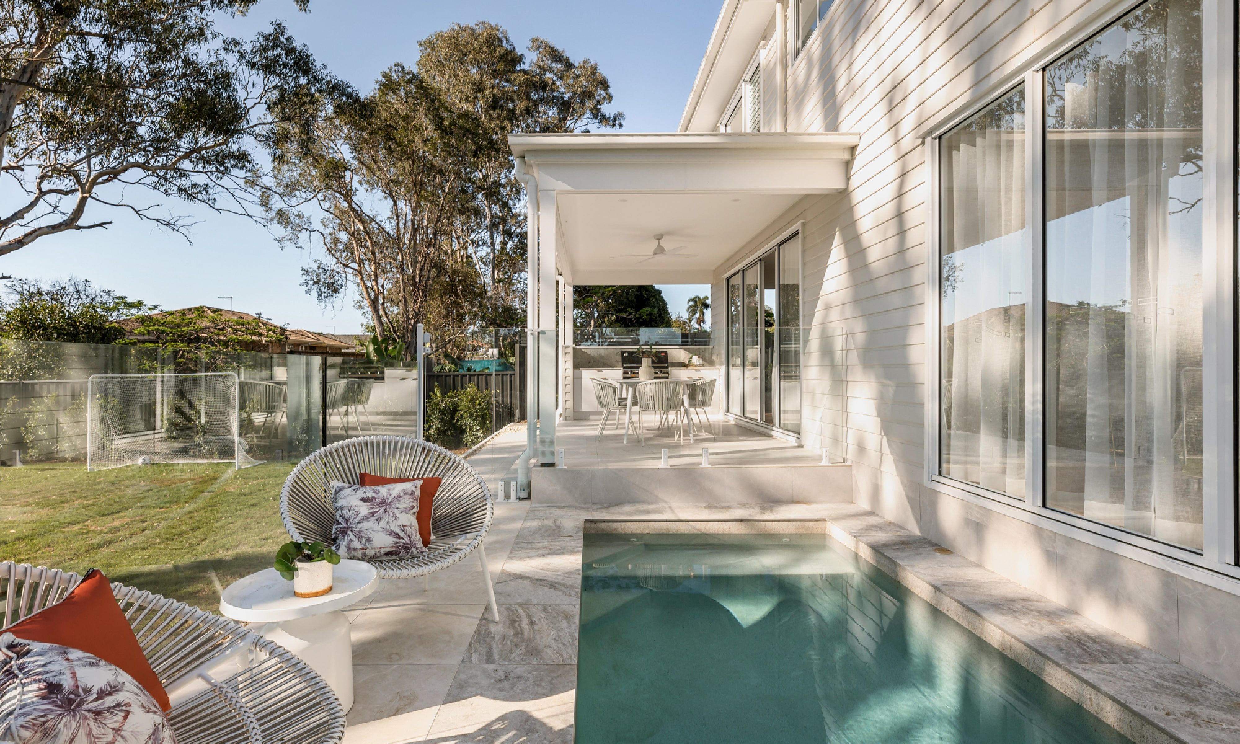 Luxurious pool, outdoor living in Pilgrim Homes custom designed home for Hamilton Street family in Tingalpa