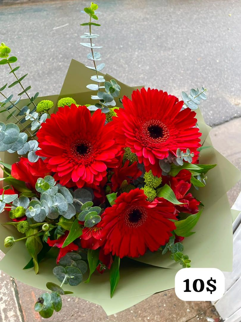 Gerberas rojas con eucalipto