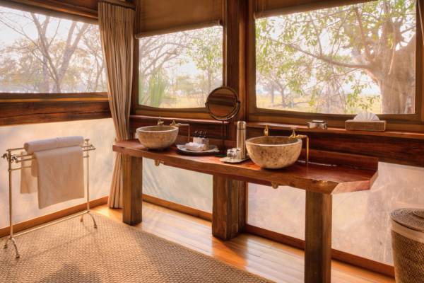 Twin sinks in luxury tented camp bathroom