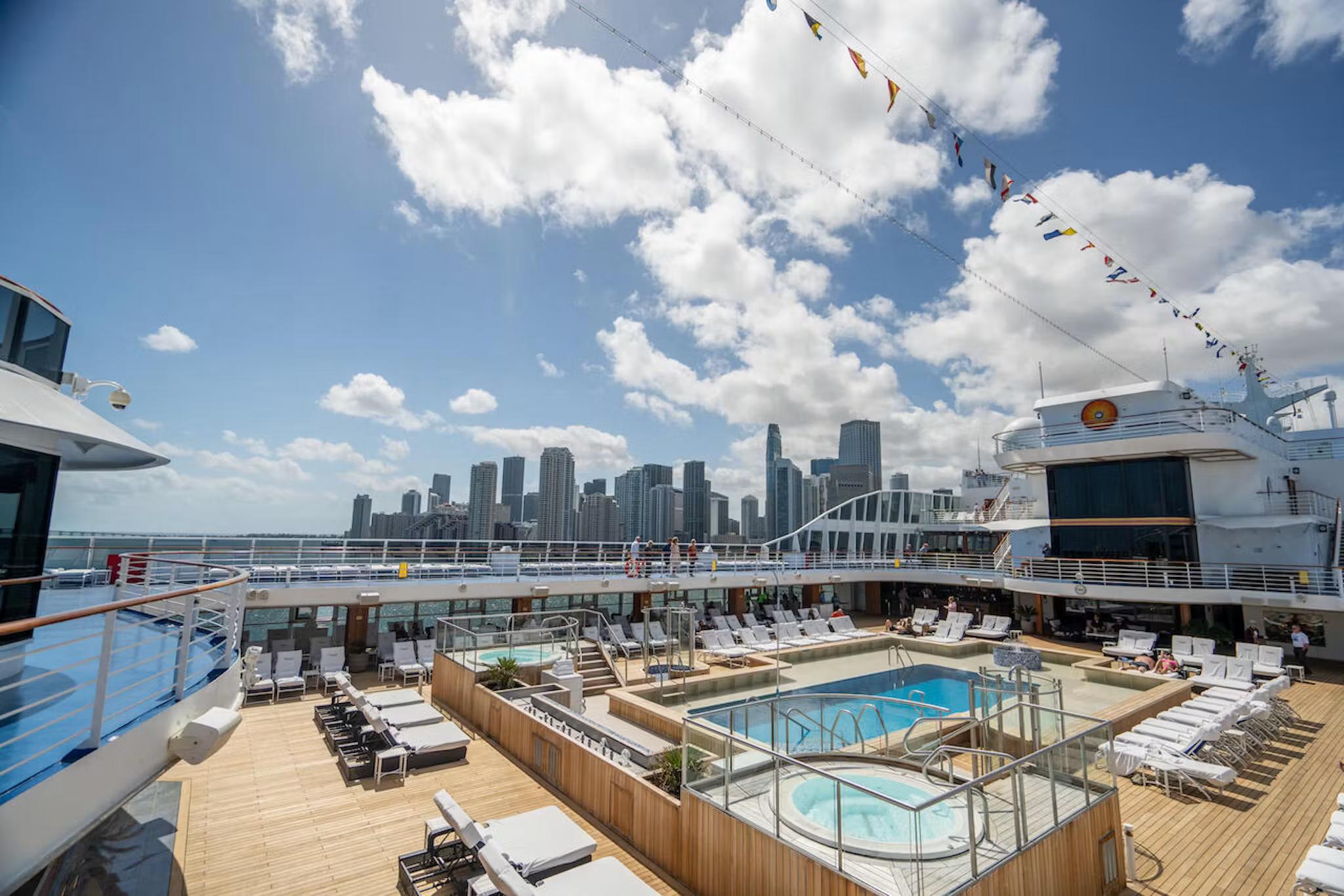 Oceania Riviera – Pool Deck – Expansive deck with loungers and ocean views