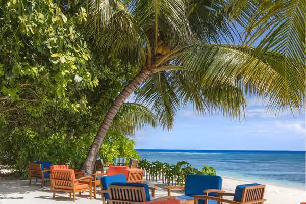 Adaaran Prestige Vadoo colourful loungers on beach