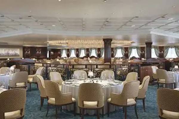 Sirena Grand Dining Room – Elegant tables, chandeliers, and refined décor