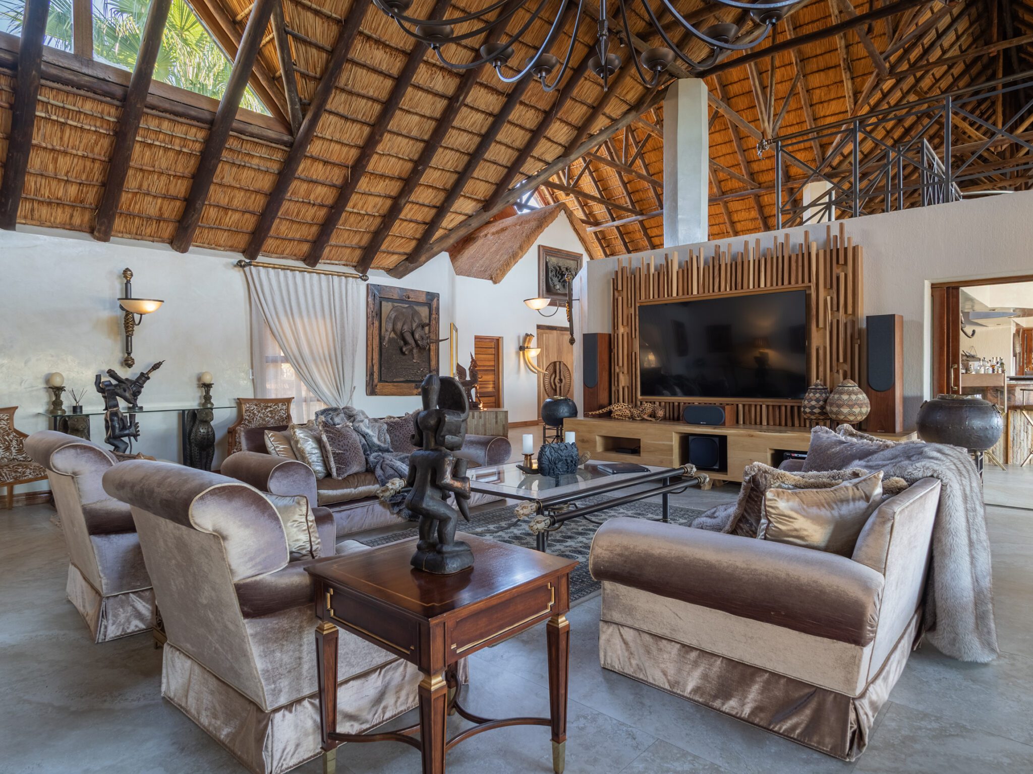 Kingfisher Villa double volume thatched lounge area interior