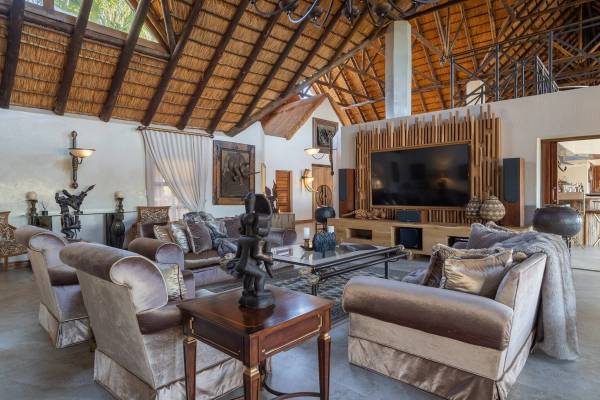 Kingfisher Villa double volume thatched lounge area interior