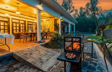 Braai outside illuminated veranda of Five Volcanoes Boutique Hotel