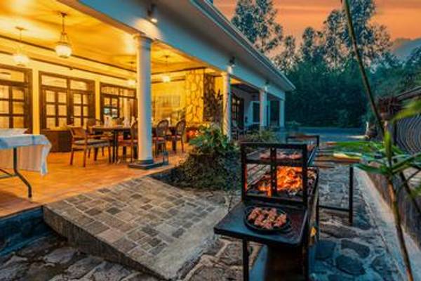 Braai outside illuminated veranda of Five Volcanoes Boutique Hotel