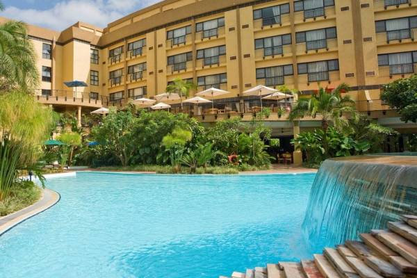 Pool in courtyards of four story Kigali Serena Hotel