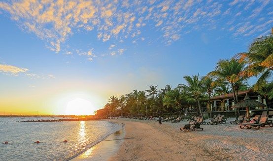 A magnificent sunset on a quiet beach at Beachcomber Mauritius.