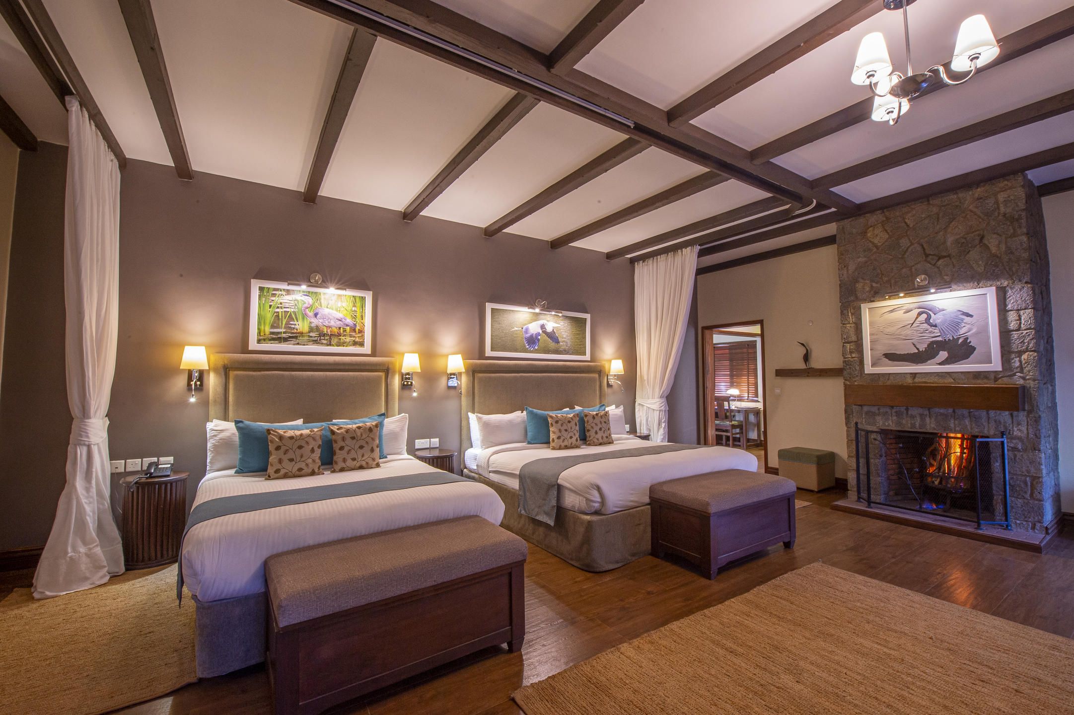 Twin villa bedroom with two double beds