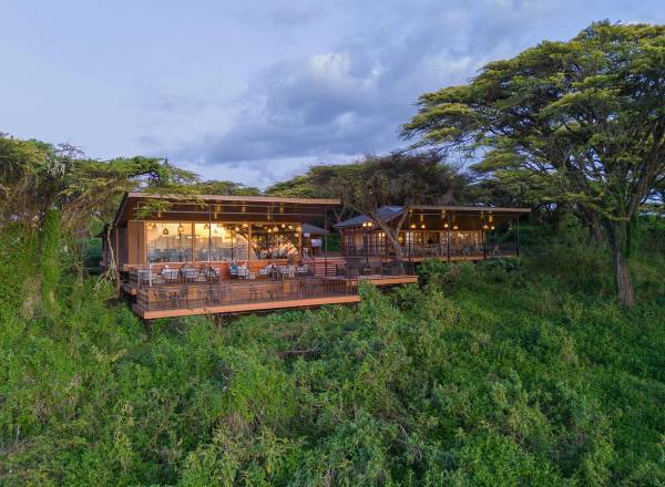 Ngorongoro wooden chalet in the lush landscape of the East rim of the Ngorongoro crater