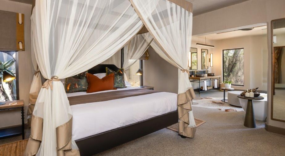 Sabi Sabi bedroom with kings sized four poster bed with mosquito net