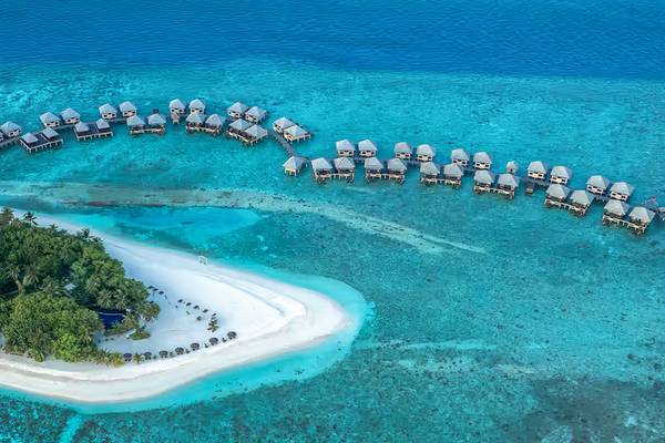 Aerial view of Adaaran Prestige Vadoo with overwater chalets