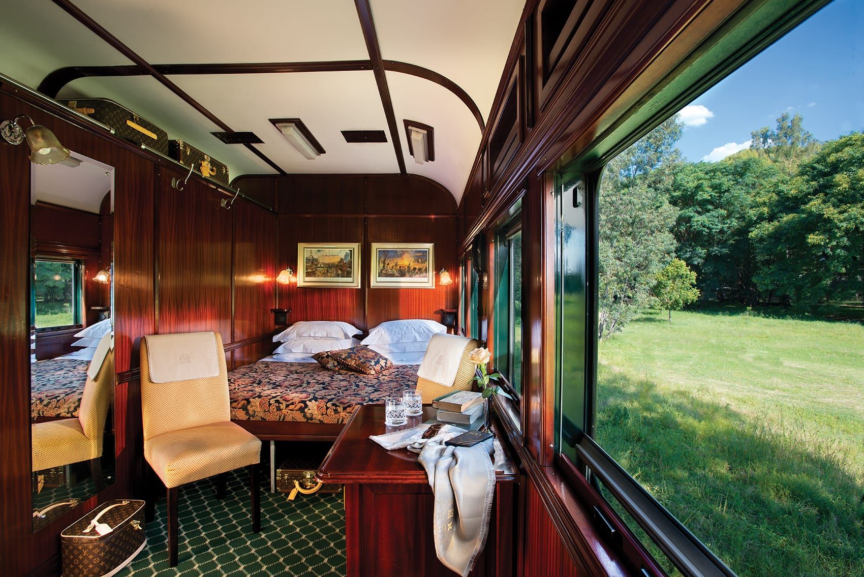 Rovos Rail woodpaneled suite with double bed