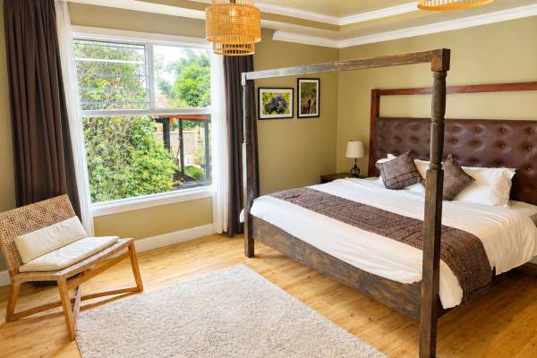 Bedroom with four poster wooden bed