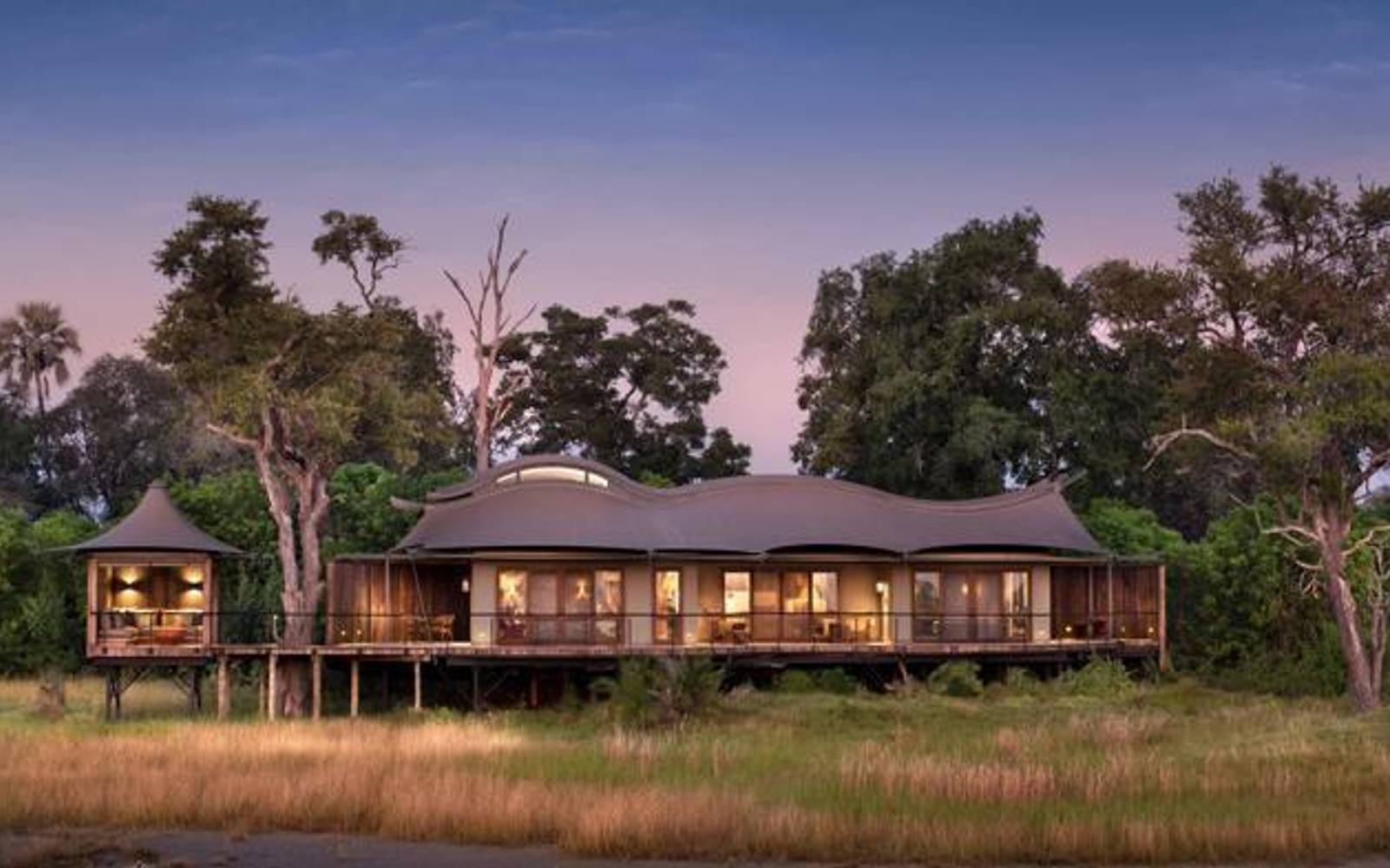 Xigera Lodge surrounded by trees