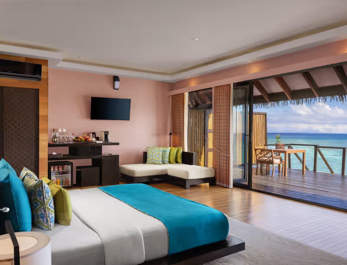 Luxury suite with double bed overlooking water