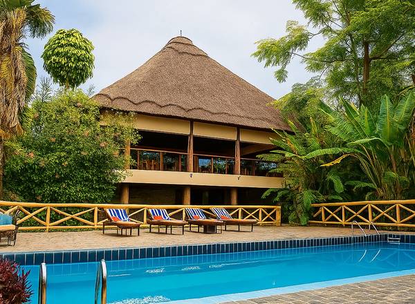 Thatched double story building with pool