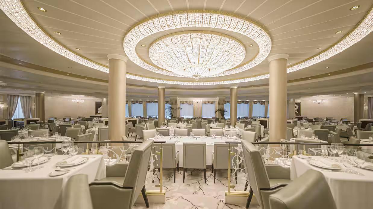 Oceania Riviera – Grand Dining Room – Elegant tables, chandeliers, and refined décor