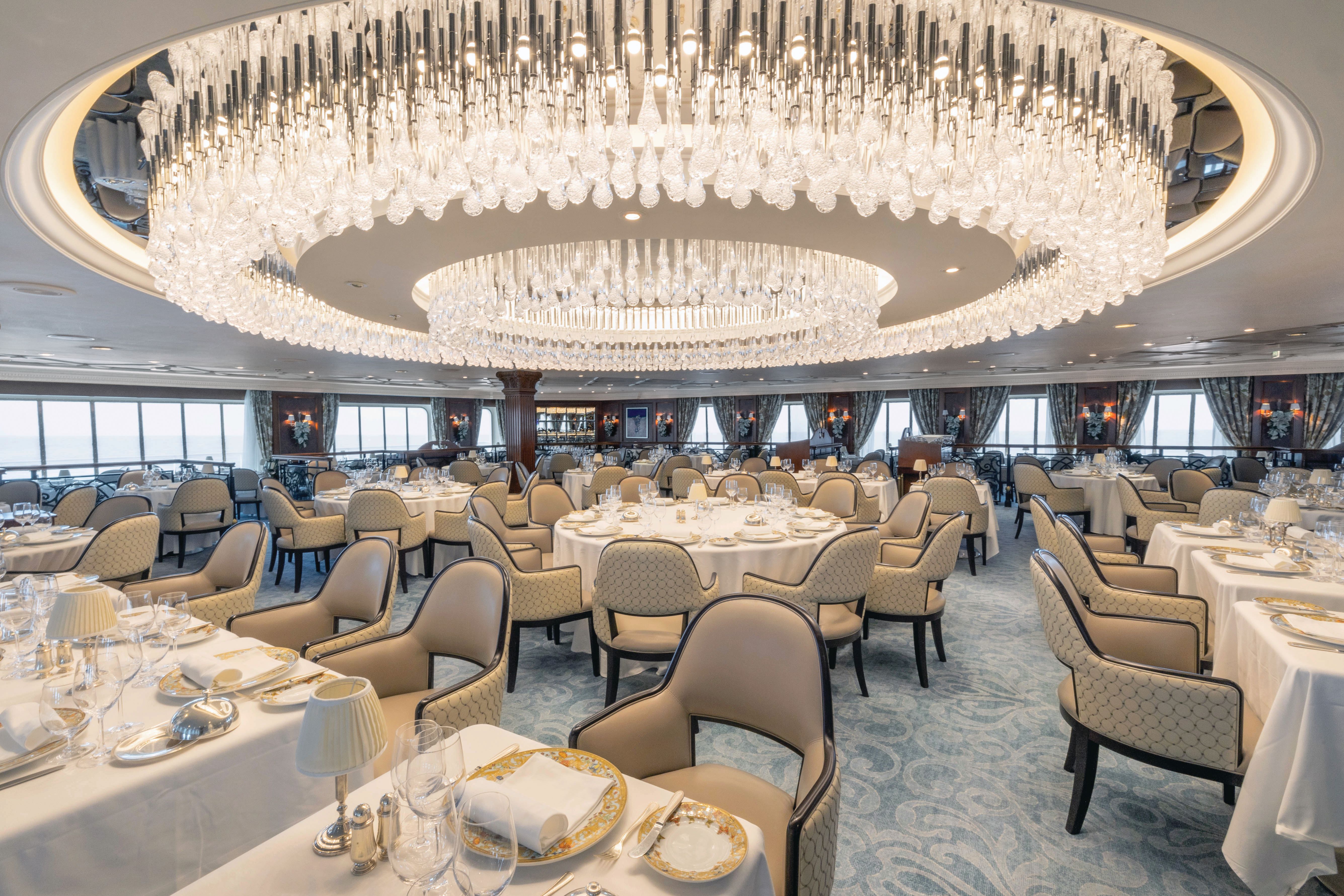 Marina Grand Dining Room – Elegant tables, chandeliers, and refined décor