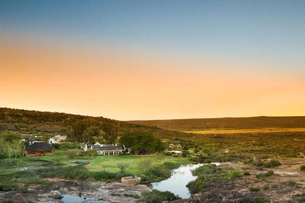 Bushmans Kloof lush green landscape with homes in the background