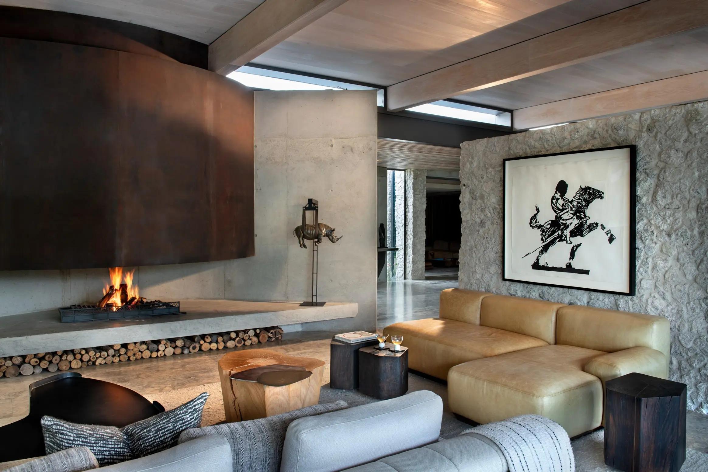 Lounge with leather sofas art and open plan fireplace