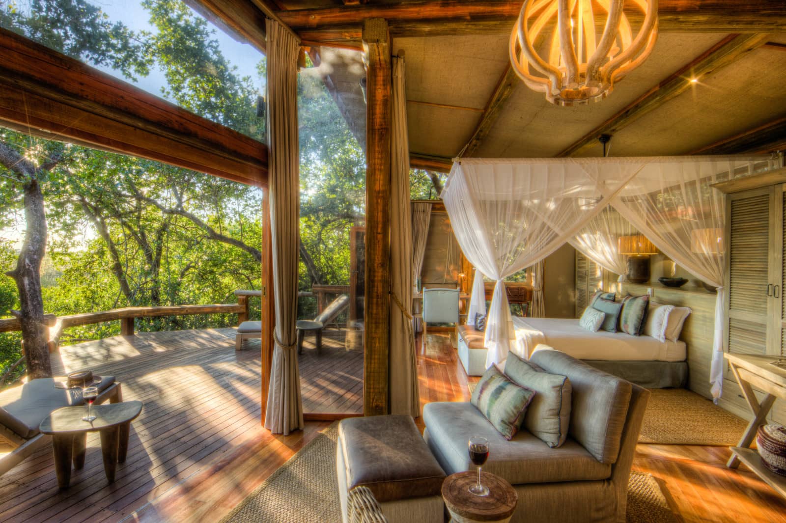 Camp Okavango suite with lounge area bedroom and terrace