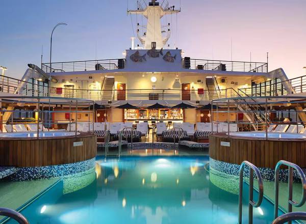 Sirena Pool Deck – Spacious deck with pool, cabanas, and loungers