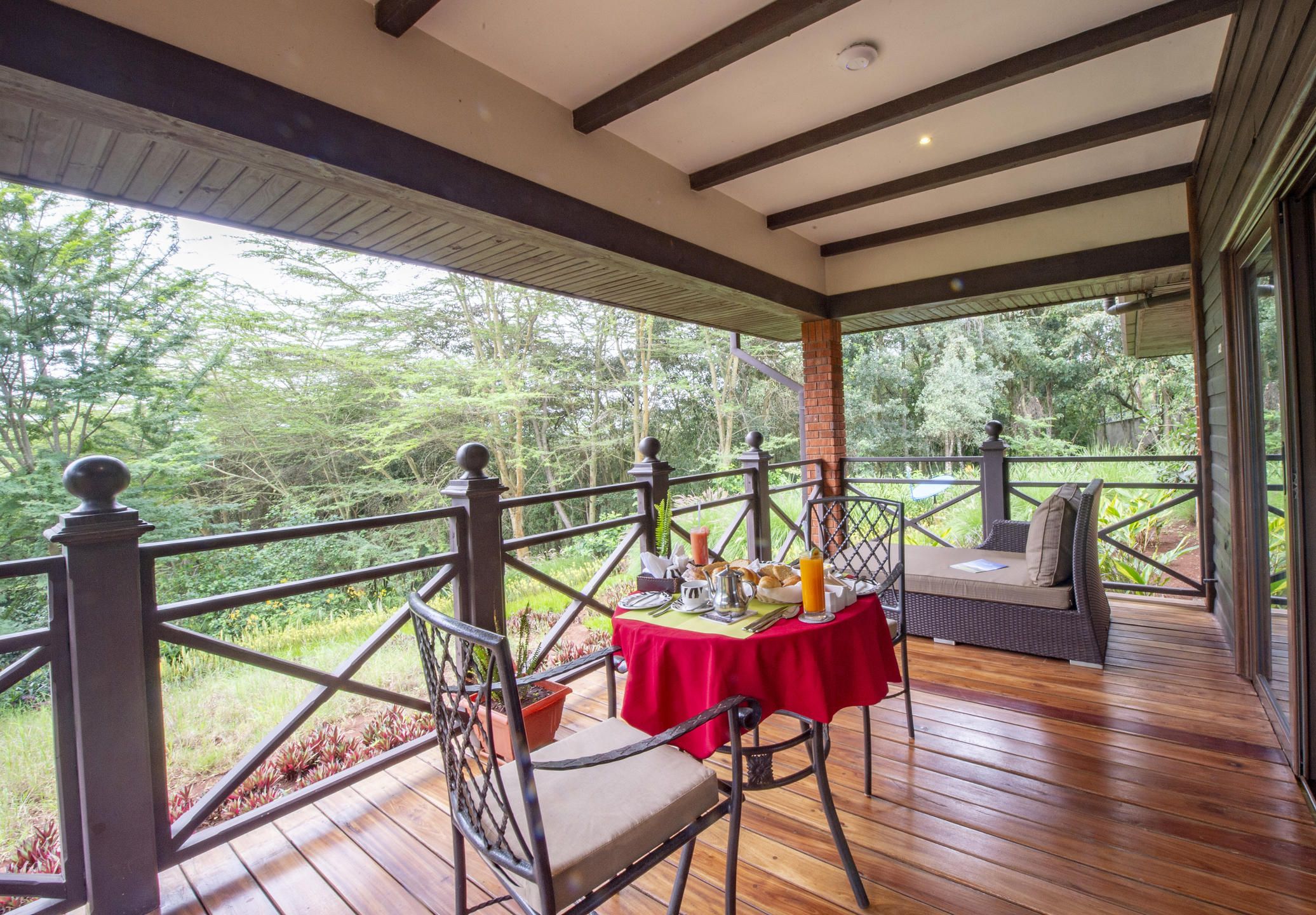 Private wooden deck with set table for two