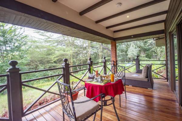 Private wooden deck with set table for two