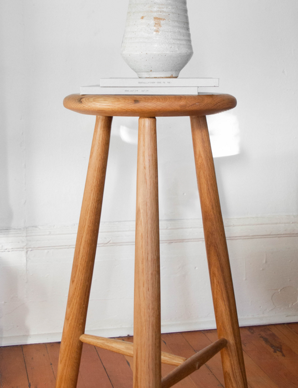 Stool on white background with wood floor