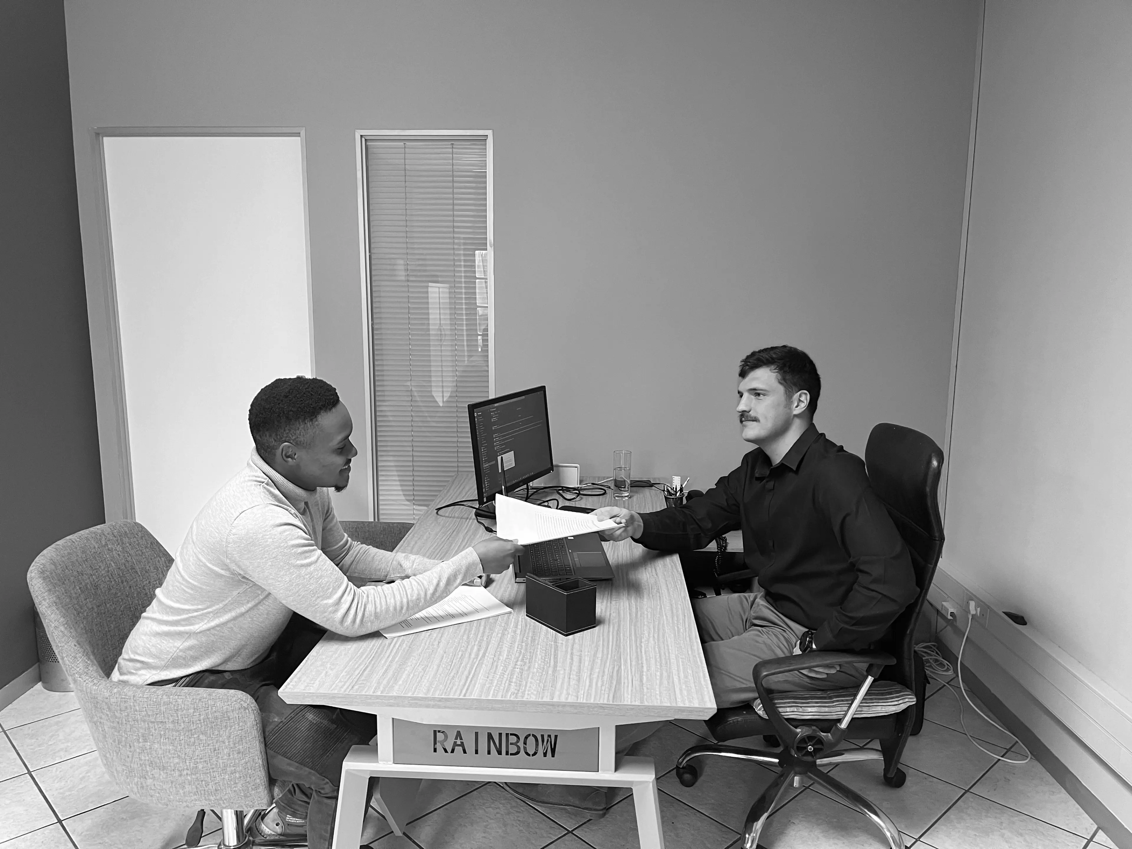 employee handing over documents