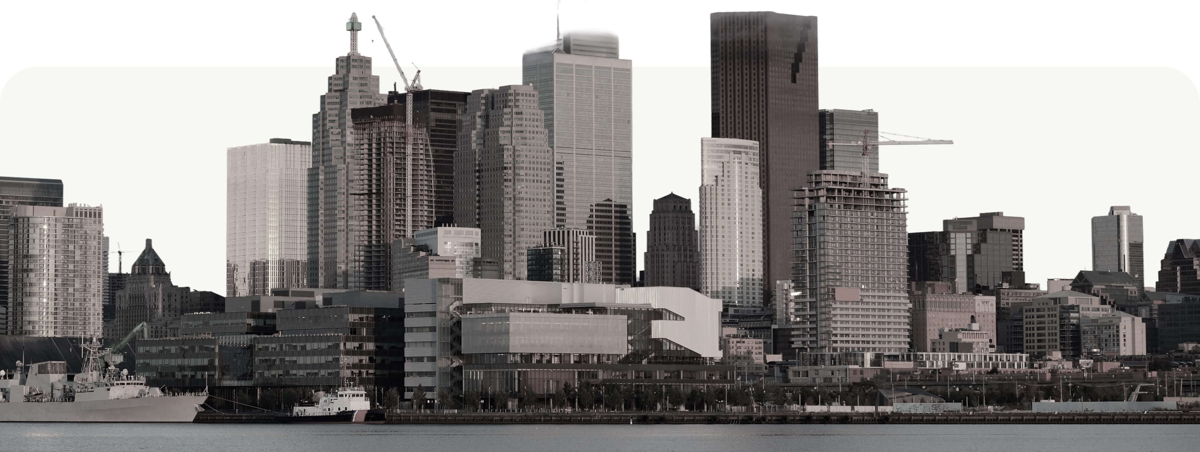 City skyline at sunrise across the water