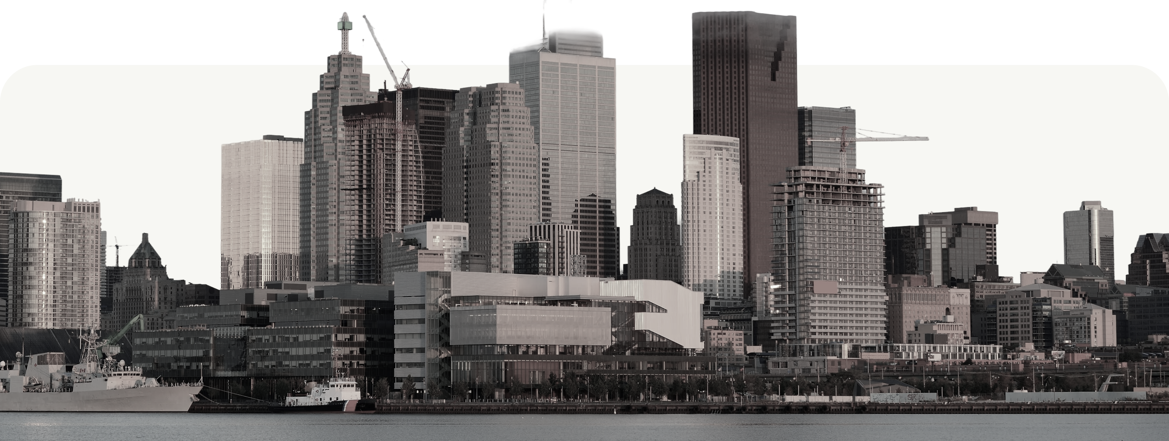 City skyline at sunrise across the water