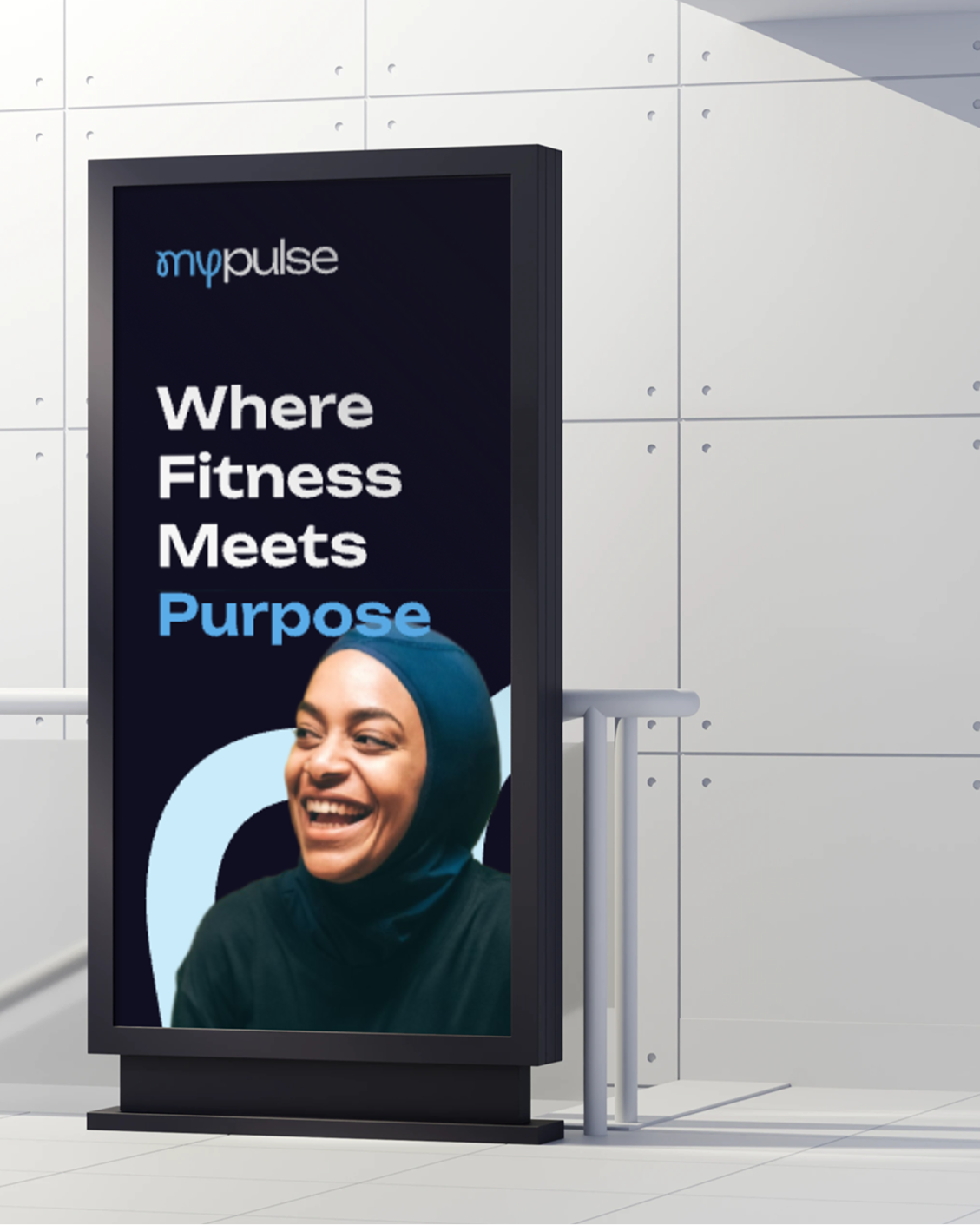 MyPulse digital signage reading 'Where Fitness Meets Purpose' with a smiling woman in a hijab